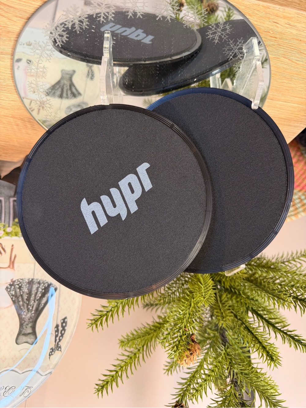 New Hypr branded core sliders used for strengthening muscle exercises